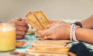 A fortune teller reads with tarot cards.