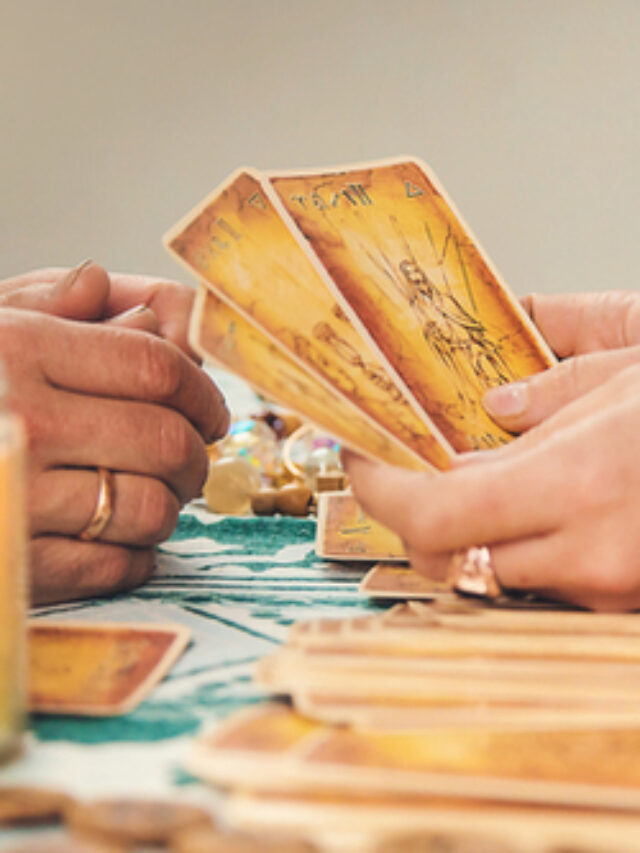 A fortune teller reads with tarot cards.